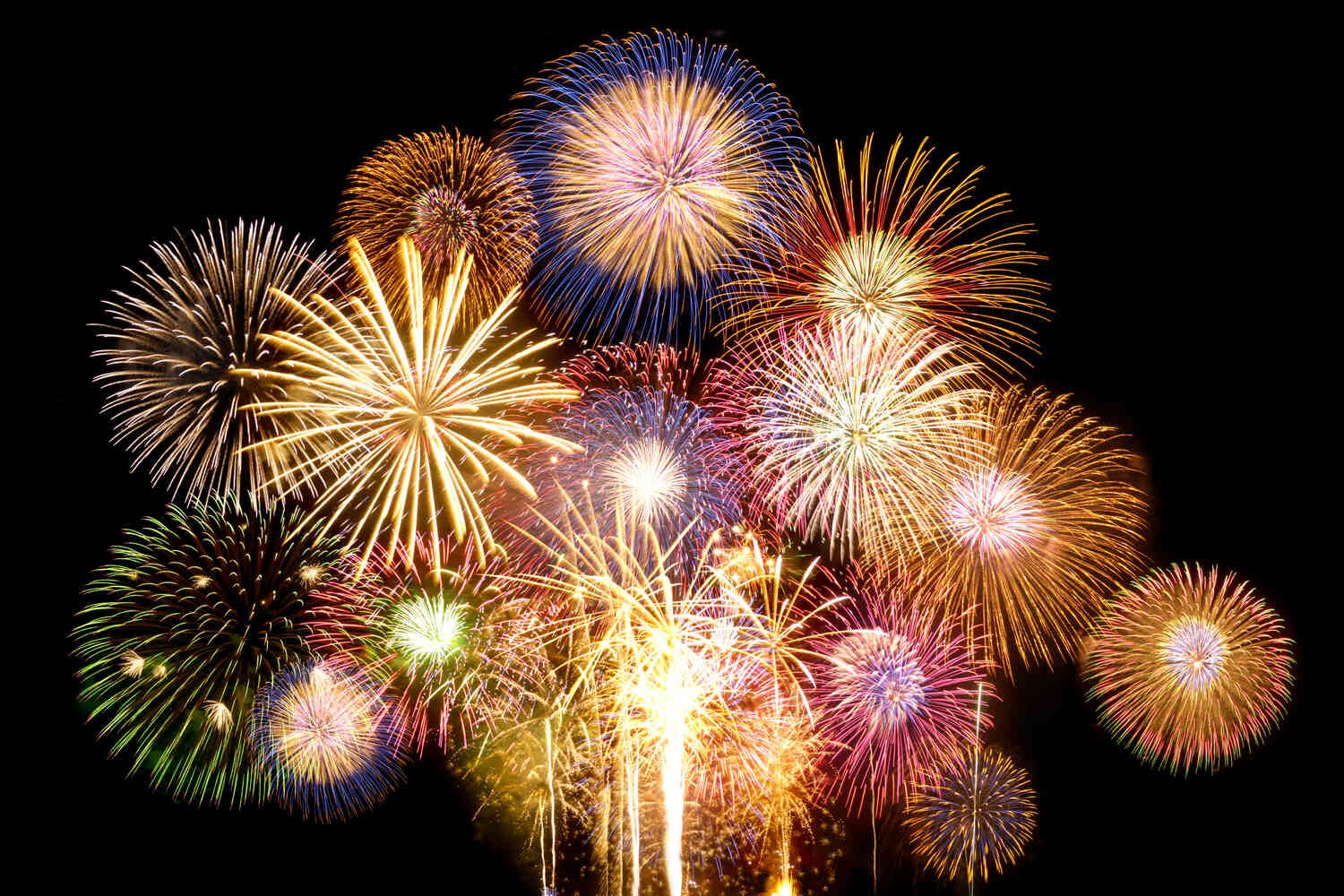 Colourful fireworks bursts filling the night sky